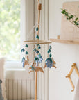 Rabbit mobile with blue flowers