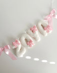 Name banner with bows