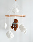 Boucle mobile with dark brown teddy bear