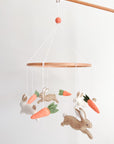 Minimalist bunny mobile with carrots