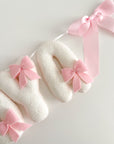 Name banner with bows