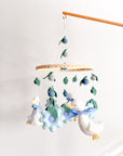 Goose mobile with blue flowers