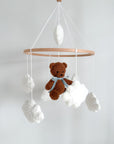 Boucle mobile with dark brown teddy bear
