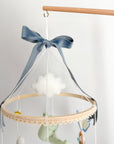 Garden rabbit mobile with blue bow