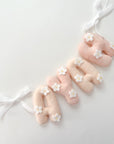 Flower name banner with bows