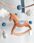 Mobile with a brown rocking horse