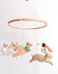 Minimalist bunny mobile with carrots
