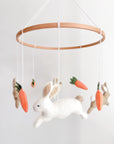 Minimalist bunny mobile with carrots