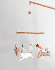Minimalist bunny mobile with carrots