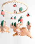 Rabbit mobile with pink flowers