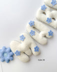 Name banner with blue flowers