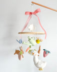 Garden rabbit mobile with pink bow