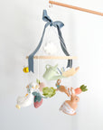 Garden rabbit mobile with blue bow
