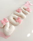 Name banner with bows