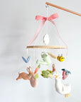 Garden rabbit mobile with pink bow