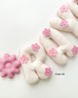 Name banner with pink flowers