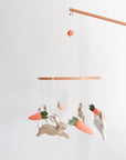 Minimalist bunny mobile with carrots