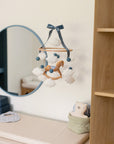 Mobile with a brown rocking horse