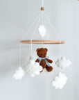 Boucle mobile with dark brown teddy bear