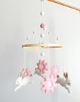 Bunny mobile with pink flowers