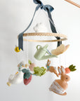 Garden rabbit mobile with blue bow