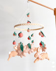 Rabbit mobile with pink flowers