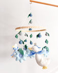 Goose mobile with blue flowers