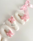 Name banner with bows