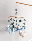 Goose mobile with blue flowers