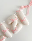 Name banner with small bows
