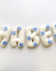 Name banner with blue flowers