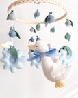 Goose mobile with blue flowers
