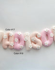 Name banner with daises