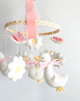 Pink mobile with goose