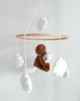 Boucle mobile with dark brown teddy bear