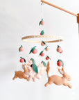 Rabbit mobile with pink flowers