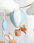 Brown bunny mobile with blue air ballon