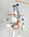 Mobile with a brown rocking horse