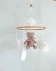 Boucle mobile with beige teddy bear
