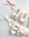 Flower name banner with bows