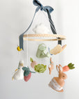 Garden rabbit mobile with blue bow