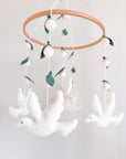 Dove mobile with leaves