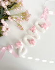 Name banner with bows