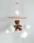 Boucle mobile with dark brown teddy bear