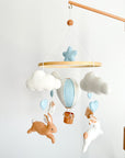 Brown bunny mobile with blue air ballon