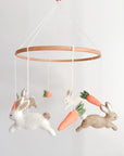 Minimalist bunny mobile with carrots