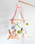 Garden rabbit mobile with pink bow