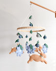 Rabbit mobile with blue flowers