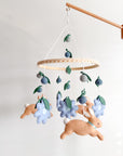 Rabbit mobile with blue flowers
