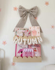 Flower name banner with bows